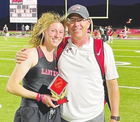 Garden City junior Barbara Wittrein, was awarded the Clint Harris Outstanding Female Athlete Award for her performance at the Cactus Relays in Iraan. She is pictured with coach Jeff Jones.