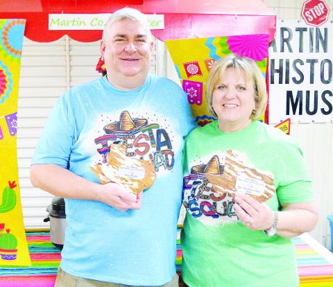 Brent Swink and Sally Poteet proudly hold up their plaques for First Place Soup and Best Decorated Table from the 34th Annual Great Texas Soup Cook-off.