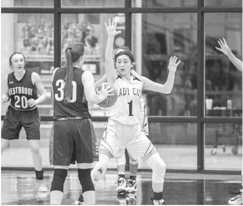 Maddy Garza plays defense at the top of the key against Westbrook.