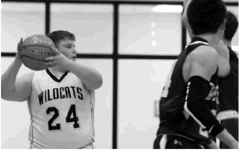 Cobe Cortez swings the ball during hardwood action against Westbrook.