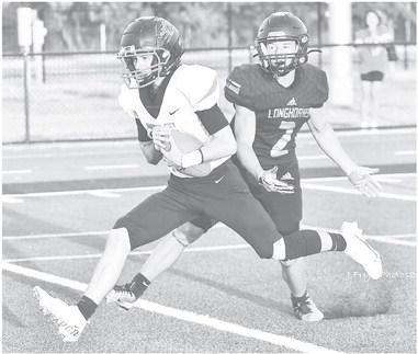 Garden City’s Keith Latch pulls in a huge reception last week against Gordon. The Bearkats have homecoming this week against Midland Trinity. photo by Janie Fryar