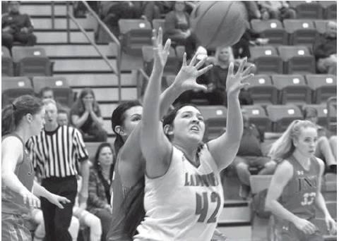Hailea Vera Cruz posts up in district action Tuesday night against Jim Ned.