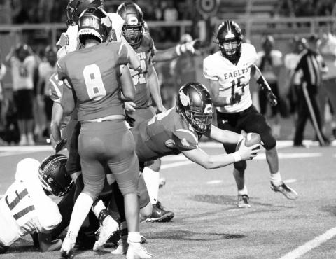 Stanton running back Evan Cox fights for every inch in the Buffs Friday night season opening victory over Grape Creek.