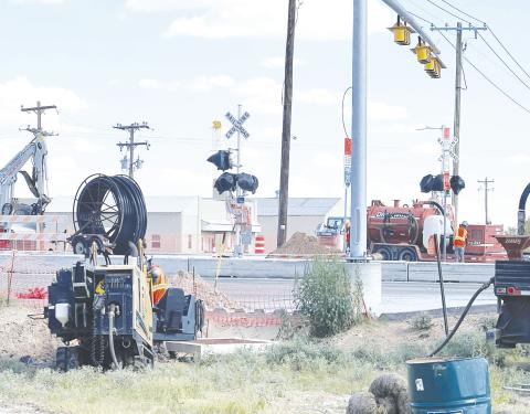 TxDOT crews look to be ready to open the railroad crossing at the intersection of Hwy 137 and BI-20, but the grand opening will have to wait until railroad crews get electricity and crossing arms installed. Earlier this week crews bored under the highway and pulled conduit in preparation to run electric wires.
