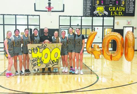 Grady Lady Wildcats basketball coach Jym Dennis earned his 400th career victory Tuesday night with a victory over Buena Vista.