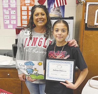 Stanton winner Aubree DeLeon (5th Grade) pictured with Brianna Allred (PBUWCD Education Coordinator)