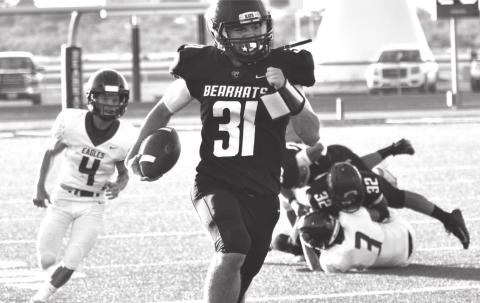 Garden City running back Mason Walker carries the ball 30 yards for a Bearkat touchdown Friday night against Sterling City.