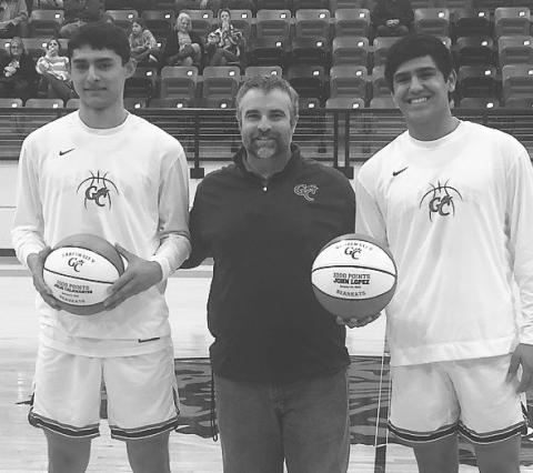 Julio Talamantes and John Lopez were honored last week with special basketballs commemorating each player scoring 1000 points.