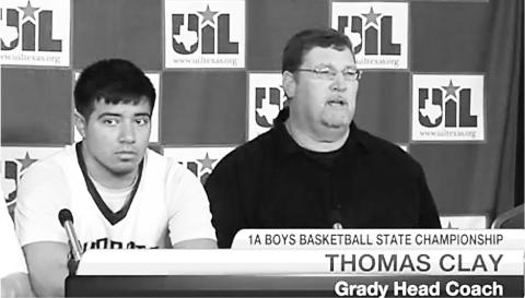 Thomas Clay speaks at a press conference at the Class A State Basketball Tournament alongside one of his favorite players of all time E.J. Rodriguez.