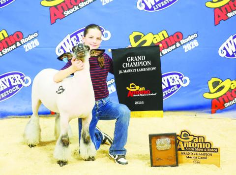 Hazyen Halfman proudly displays her Grand Champion Lamb at the San Antonio Stock Show &amp; Rodeo, earning top honors against strong competition and showcasing years of hard work and dedication in the show ring.