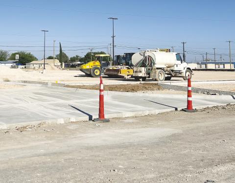 There has been a flurry of activity at Stanton High School as crews work to get the new parking lot completed before graduation.