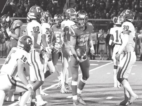 Stanton running back Ryan Andler flexes after picking up a big first down during Stanton’s stunning 39-34 bi-district victory over No. 3 Childress last Thursday in by Neeley Poitevint Floydada.