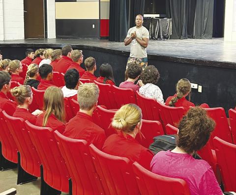 Former team USA sprinter Ernest Wiggins returned to West Texas last Friday to speak to athletes at the Bearkat Relays track meet in Garden City.
