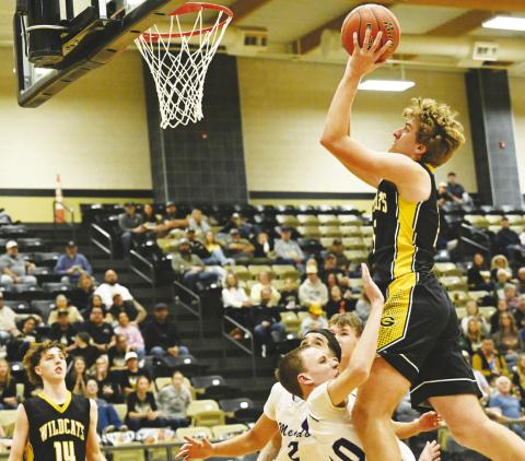 Grady’s Knight Durham scores a tough two points during bi-district action against Meadow at Lamesa High School on Tuesday.