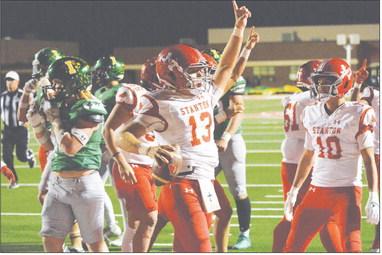 Stanton senior quarterback Jake Benedict (13) scores his final touchdown as a Buffalo during the Area round of the Class 3A DII playoffs Friday night in Denver City. The Buffaloes fell to Idalou 52-14 and finished with a 7-5 record, the best since 2010 and the first winning season since 2013.