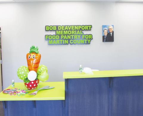 BOTTOM LEFT: A picture of Bob and Dorthy Deavanport hang on the wall of the new food pantry in Stanton.