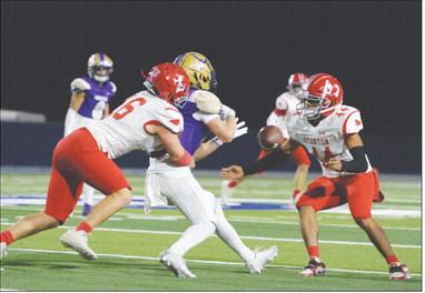 Stanton linebacker Aiden Louder (16) forces a fumble and Jaiden Bernal (44) recovered it during Bi-District action at Fort Stockton on Thursday.