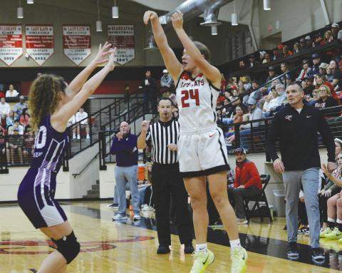 All eyes were on Garden City Lady Bearkat Brylon Frerich as she launches a 3-pointer during the Lady Kats district victory over Irion County on Tuesday.