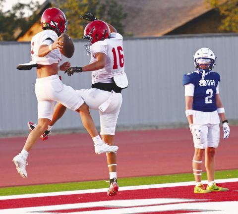 The Stanton Buffaloes celebrate a touchdown during last week’s scrimmage against Odessa Compass. The Buffs open the season of Friday in Monahans.