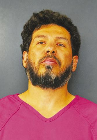 Oscar Perez, 35, is charged with aggravated kidnapping causing bodily injury and aggravated assault with a deadly weapon in connection with the June 6 assault and kidnapping of his girlfriend in Martin County. Booking photo courtesy of the Martin County Sheriff’s Office. (This photo has been digitally enhanced)