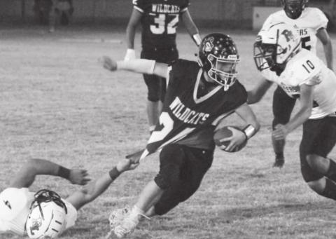 Grady’s Caden Hayes (24) gets slowed by a downed Steer, only momentarily however as he rushed for 245 in Grady’s 62-14 homecoming victory.