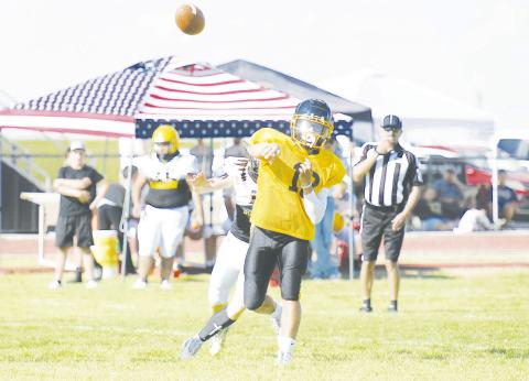 Grady quarterback Marcus Brown drops a dime during the Wildcat’s scrimmage against Lorine last Friday in Grady.