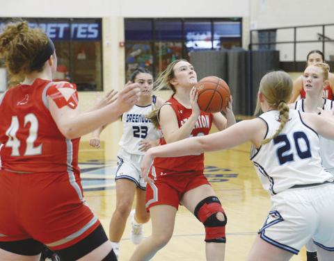 Stanton’s Addison Chandler scores two of her 11 points in the Lady Buffs game against Greenwood on Tuesday.