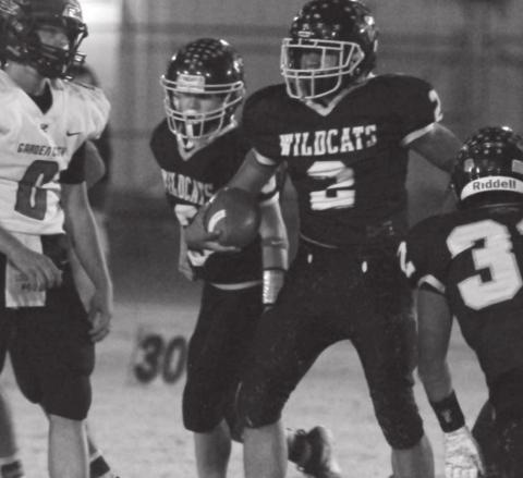 Frankie Jimenez (2) recovers a fumble during district action last week at Grady.