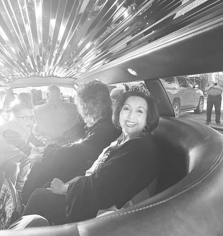 Diana Hernandez knows how to retire in style as her and her family cruise out of the Wes-Tex parking lot in a limousine after more than 24 years of service to the Stanton business.