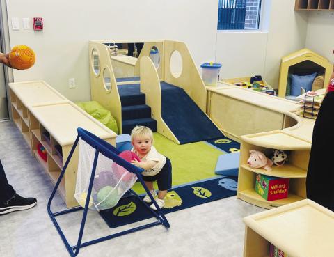Little Beau Belew checks out the new toys during the grand opening of Glasscock County ISD’s daycare. Pic courtesy Mallory Marr