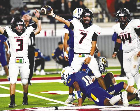 Garden City’s Uziel Lopez recovers a fumble during the Bearkats Bi-District contest against Whiteface. by Janie Fryar