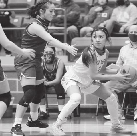 Stanton’s Kayleigh Villa secures a loose ball on the baseline and looks to drop a pass into the post during district action against Crane earlier this season.