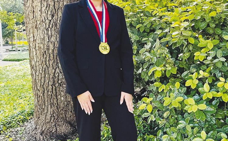 LEFT: Ella Brinkley is the Class 1A State Prose Champion.