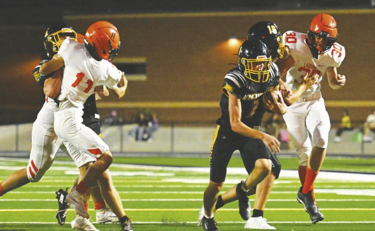 Wildcats overcome early adversity, pull away from Lazbuddie for 66-20 victory