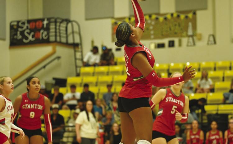 Stanton’s Addi Saddler lines up a kill during non-district volleyball action earlier this season.